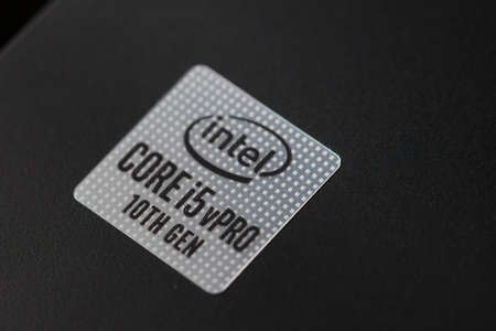 Inter Corporation logo on a sticker of a Lenovo Thinkpad with a Core i5 10th gen processor.のeditorial素材