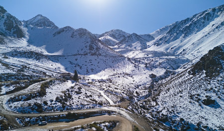 Snow covered Andes mountains near Vallecitos, in Mendoza, Argentina, on a clear sunny day.の写真素材