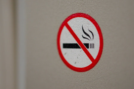 Signboard indicating that it is forbidden to smoke in the area.の写真素材
