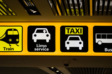 Information sign at an airport showing transportation means to get to the city.の写真素材