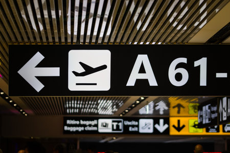 Information signboard at an airport, indicating the departures area.の写真素材