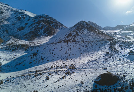 Snow covered Andes mountains near Vallecitos, in Mendoza, Argentina, on a clear sunny day.の写真素材