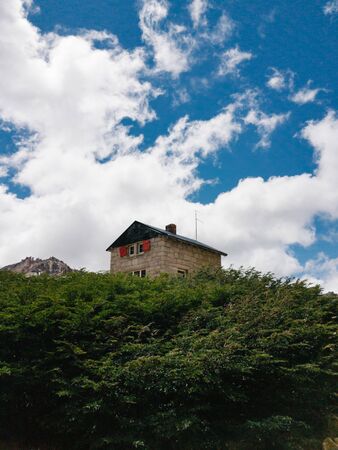 view of frey mountain refuge at top of the mountain