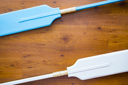 Oars on wooden backgroundの写真素材