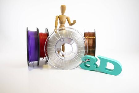 3D printing filament reels with wooden anthropomorphic doll with text