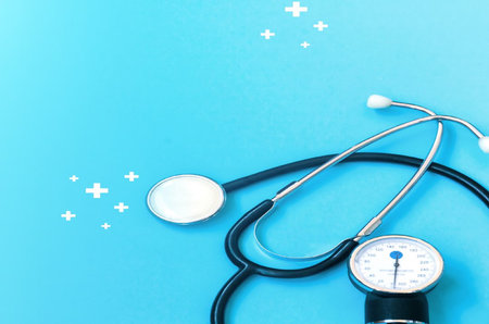 Stethoscope and stethoscope on blue background with copy spaceの写真素材