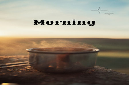 Conceptual image with the word morning and a cup of coffee on a blurred backgroundの写真素材