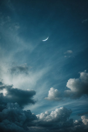 Night sky with clouds and moon. Beautiful natural background. Toned.の素材