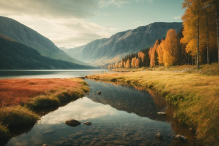 Beautiful autumn landscape with lake and mountains in the background. Toned.の素材