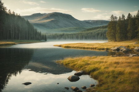 Mountain lake in the mountains at sunrise. Beautiful summer landscape.の素材