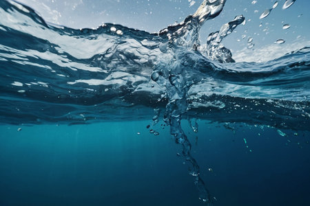 Underwater view of the surface of the ocean with splashing wavesの素材