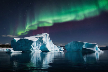 Aurora borealis over icebergs in Jokulsarlon, Icelandの素材