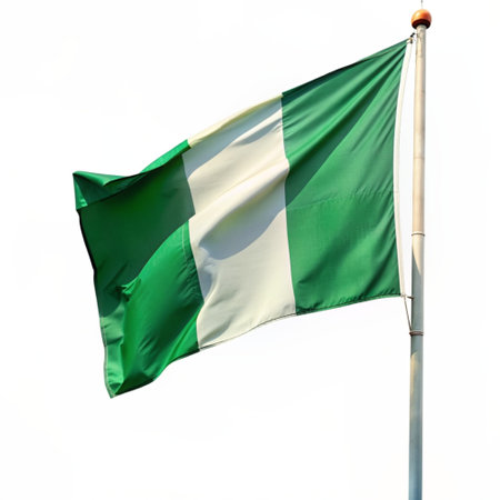 Nigeria flag waving in the wind isolated on white background.の素材