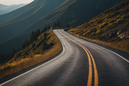 Asphalt road in the mountains at sunset. Road in the mountains.の素材