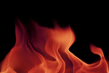 close up of fire flames on black background, abstract fire flames backgroundの写真素材
