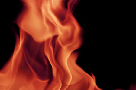 Fire flames on black background, abstract blaze fire flame texture background.