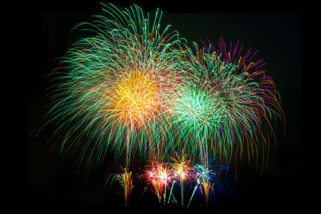 Colorful fireworks on the black sky background, Happy new year.の写真素材
