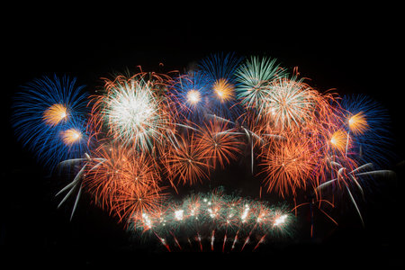 Beautiful colorful firework display for celebrating happy new year and merry christmas