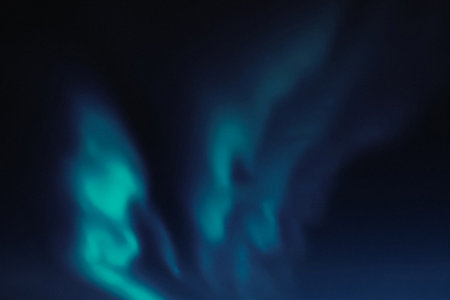 Blue fire in the dark. Abstract background and texture for design.の写真素材