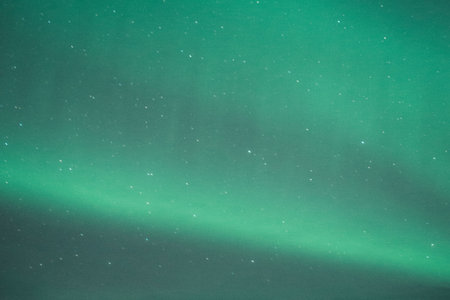 Aurora borealis, also known as the northern lights, is a cluster of stars in the universe.の写真素材