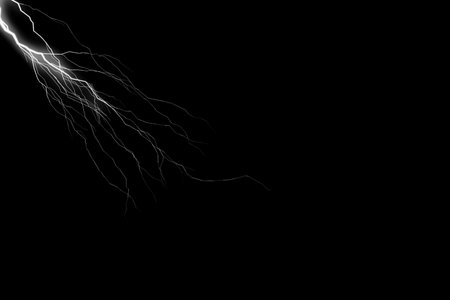 Lightning strike on a black background. Abstract lightning isolated on black background.の写真素材