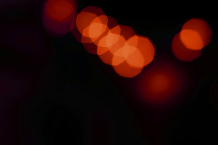 Colorful bokeh lights on black background. Abstract background.の写真素材