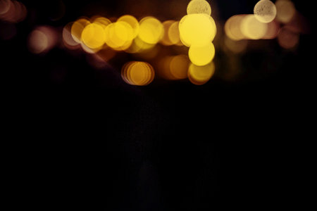 Abstract circular bokeh background of city at night, defocused