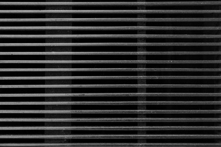 Metal grille texture. Black and white. Abstract background and texture for design.の写真素材