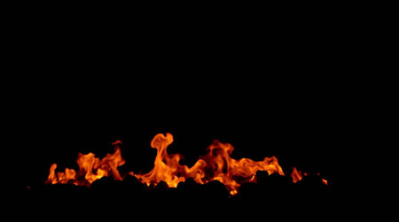 Fire flames isolated on black background. Close up of fire flames isolated on black background.の写真素材