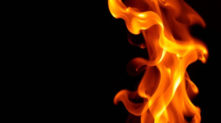 Fire flames on black background, abstract blaze fire flame texture background.