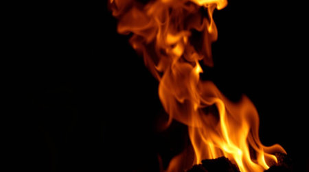 Fire flames on black background. Closeup of fire flames isolated on black background.の写真素材