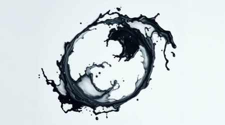 Splash of black liquid on a white background. Top view.