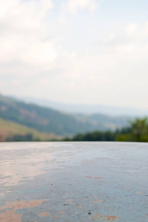 Close up of stone floor with mountain view background, selective focus.の写真素材