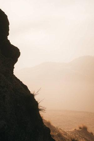 Mountain landscape in the morning mist. View from the cliff.の写真素材