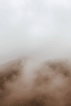 Foggy morning in the mountains. Abstract background for design.の写真素材