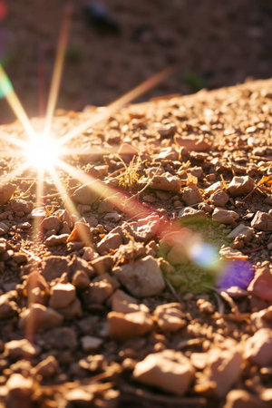 Sunlight shining through the rocks in the desert, close-upの写真素材