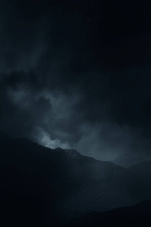 Foggy night in the mountains with dark clouds, natural background