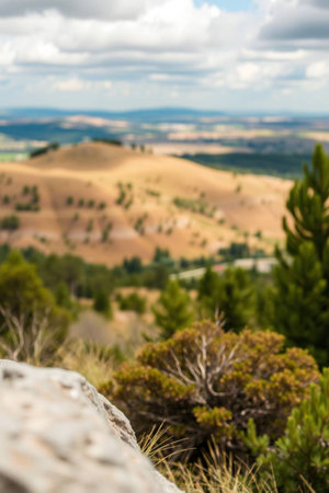 View from the top of the mountain to the valley and the valleyの写真素材