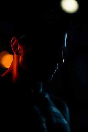 Silhouette of a man in the dark. Close-upの写真素材