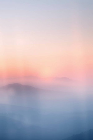 Sunrise over the foggy mountains. Beautiful landscape in the morning.の写真素材