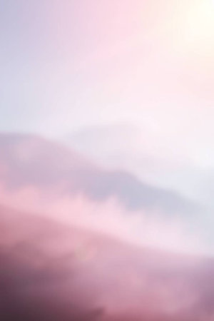 Beautiful foggy sunrise in the mountains. Blurred background.の写真素材