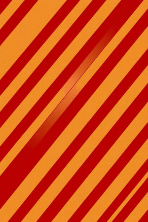 Striped red and yellow background with a diagonal line in the centerの写真素材