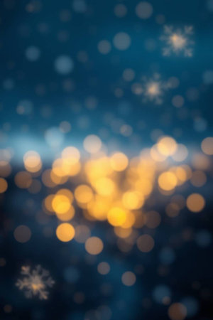 Abstract circular bokeh background of Christmaslight and snowflakesの写真素材