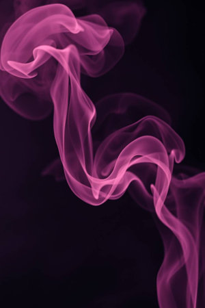 Purple smoke on black background. Abstract background. Design element.の写真素材