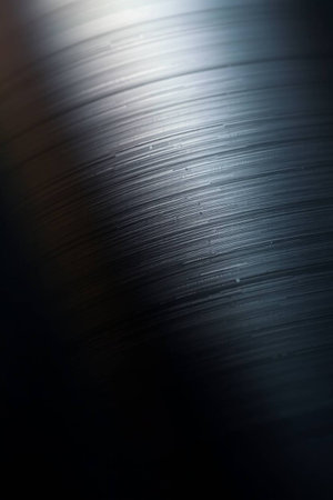 close up of a vinyl record in black background, shallow depth of fieldの写真素材