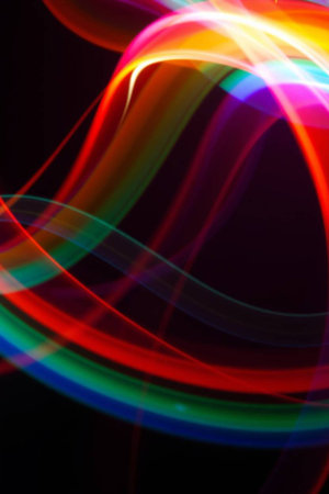 abstract colorful background with blurred magic light curved lines and bokehの写真素材