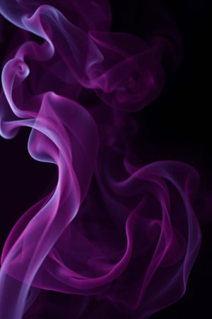 purple smoke on black background close up, abstract background, design elementの写真素材