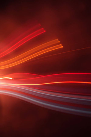 abstract background with red and blue lines on a dark background.の写真素材