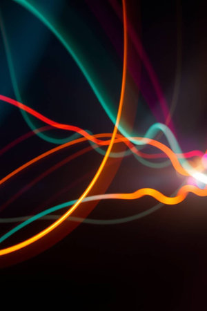 abstract background with colorful lines and bokeh defocused lights