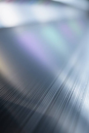 abstract background of a metal surface with some smooth lines in it